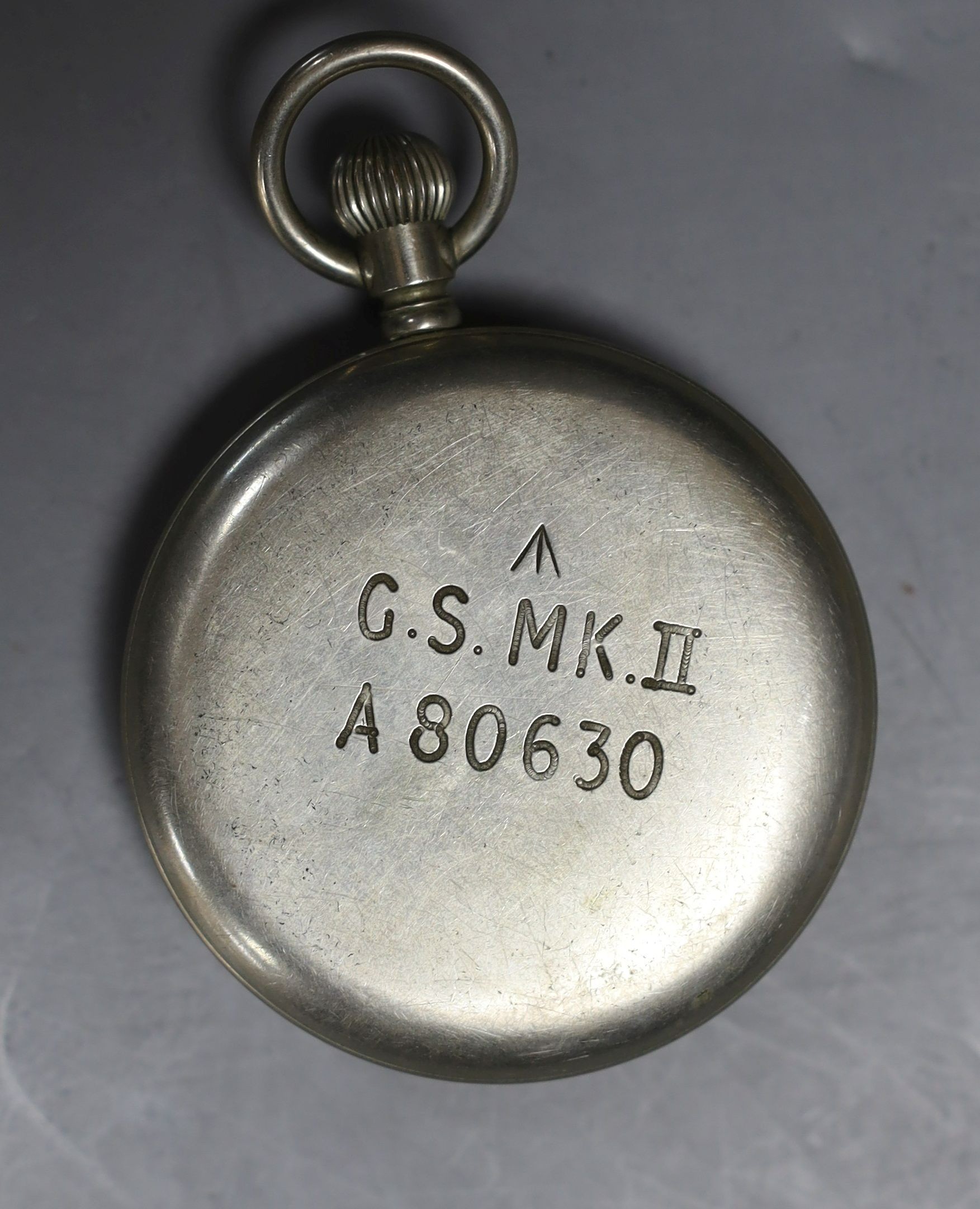 A group of five WW2 medals, together with a selection of cap badges and a GS Mk.II pocket watch